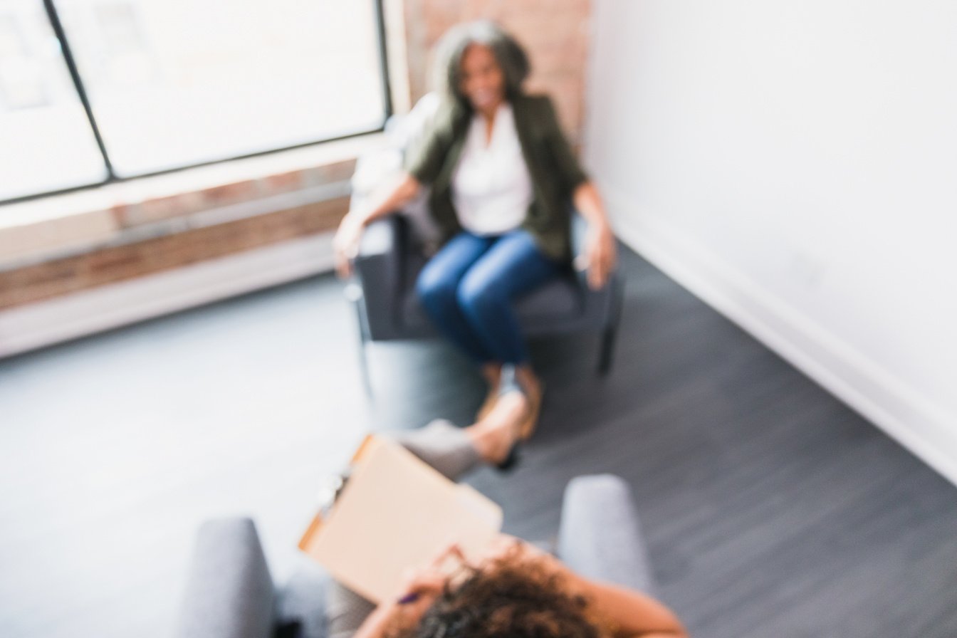 Therapist and patient talking during therapy session